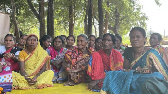 Women tribal farmers who have formed a collective to sell marigold flowers in Rayagada's Dengasargi village.